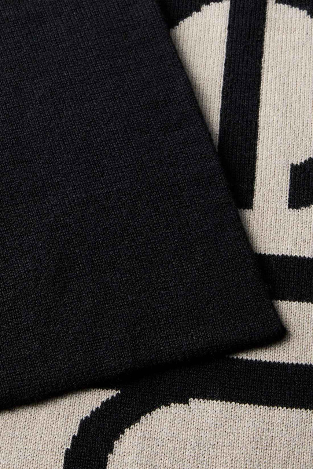 Black wool cashmere scarf with beige designer logo inlay, measuring 28 by 200 centimeters. — view 2