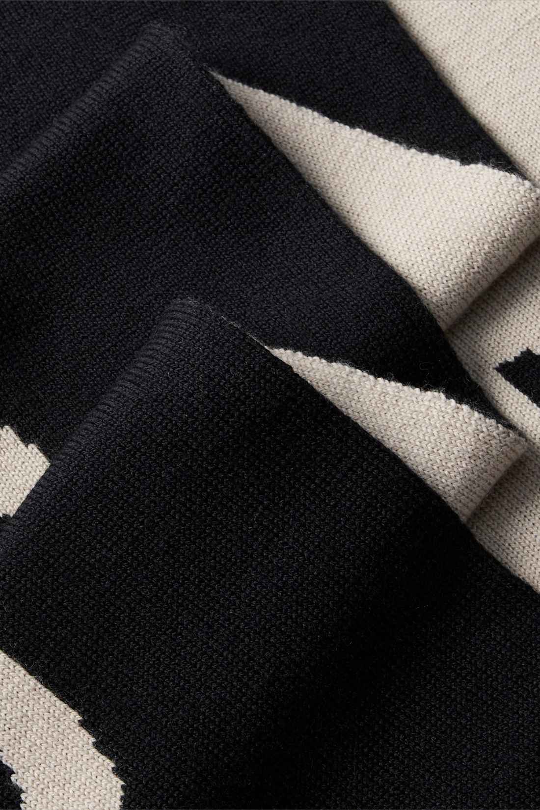 Black wool cashmere scarf with beige designer logo inlay, measuring 28 by 200 centimeters. — view 3