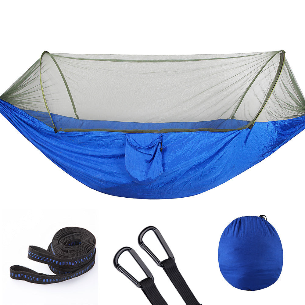 Portable nylon camping hammock with mosquito net, tree straps, and compact black storage bag — view 2