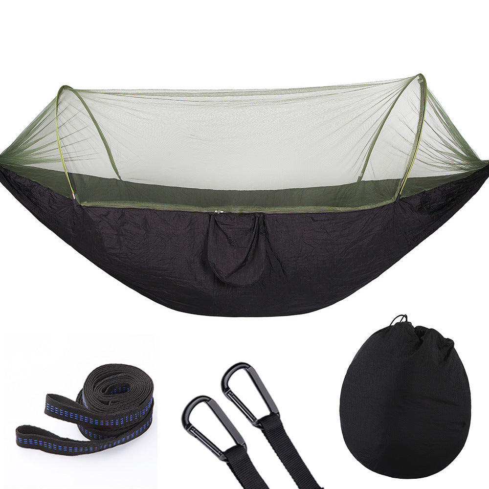 Portable nylon camping hammock with mosquito net, tree straps, and compact black storage bag — view 3