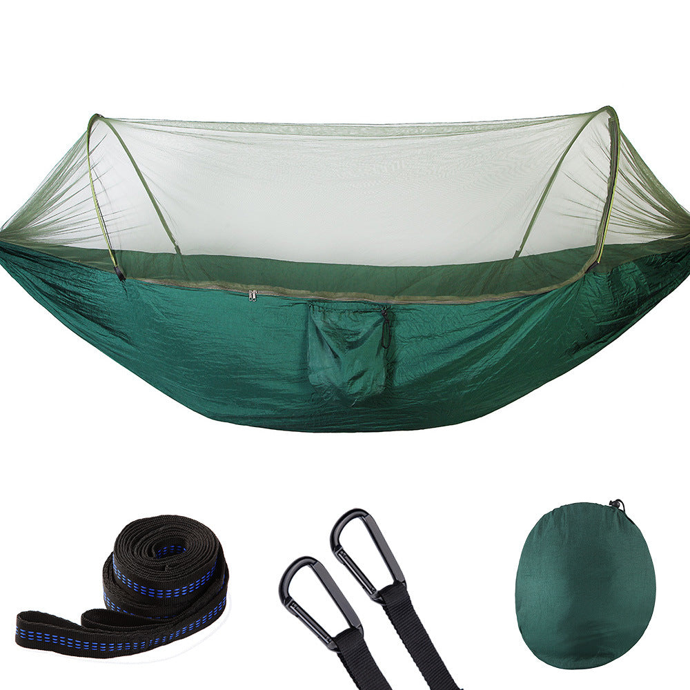 Portable nylon camping hammock with mosquito net, tree straps, and compact black storage bag — view 4