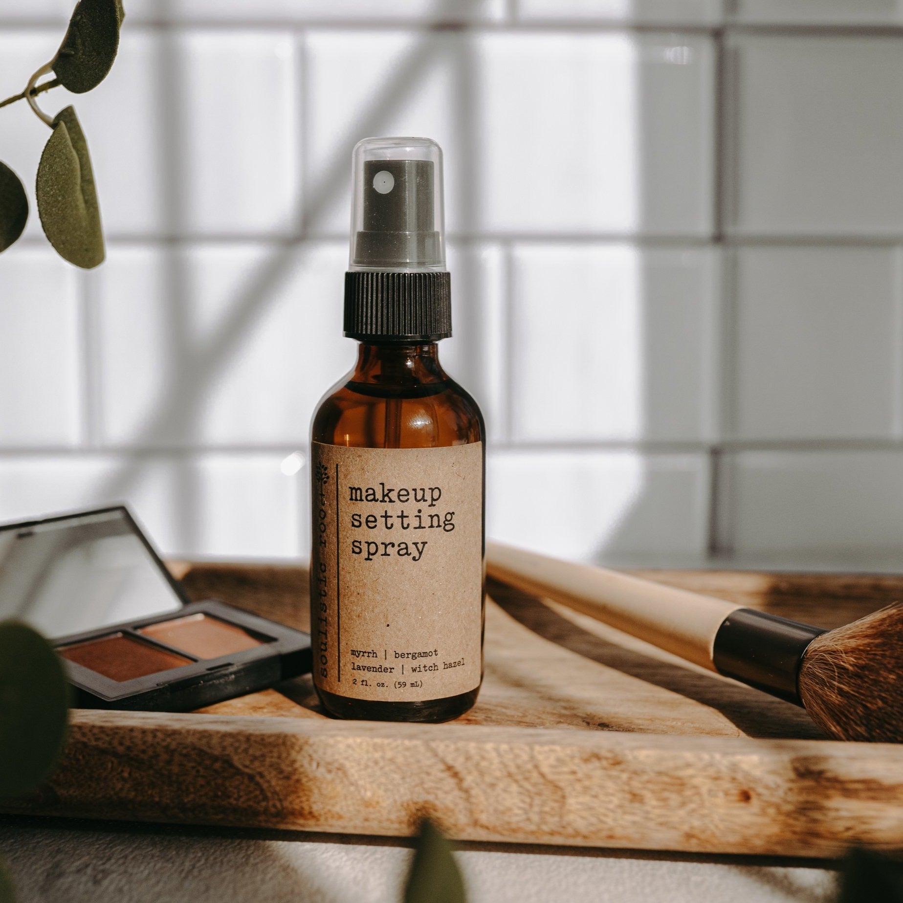 Natural makeup setting spray in a 2oz travel bottle with a fine mist applicator. — view 3