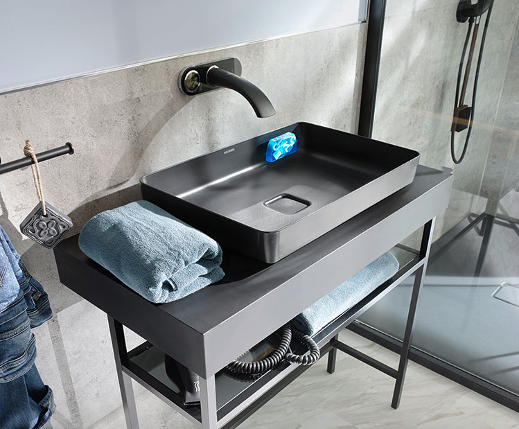 SAVONT magnetic floating soap holder attached to a white bathroom sink with a solid soap bar — view 3