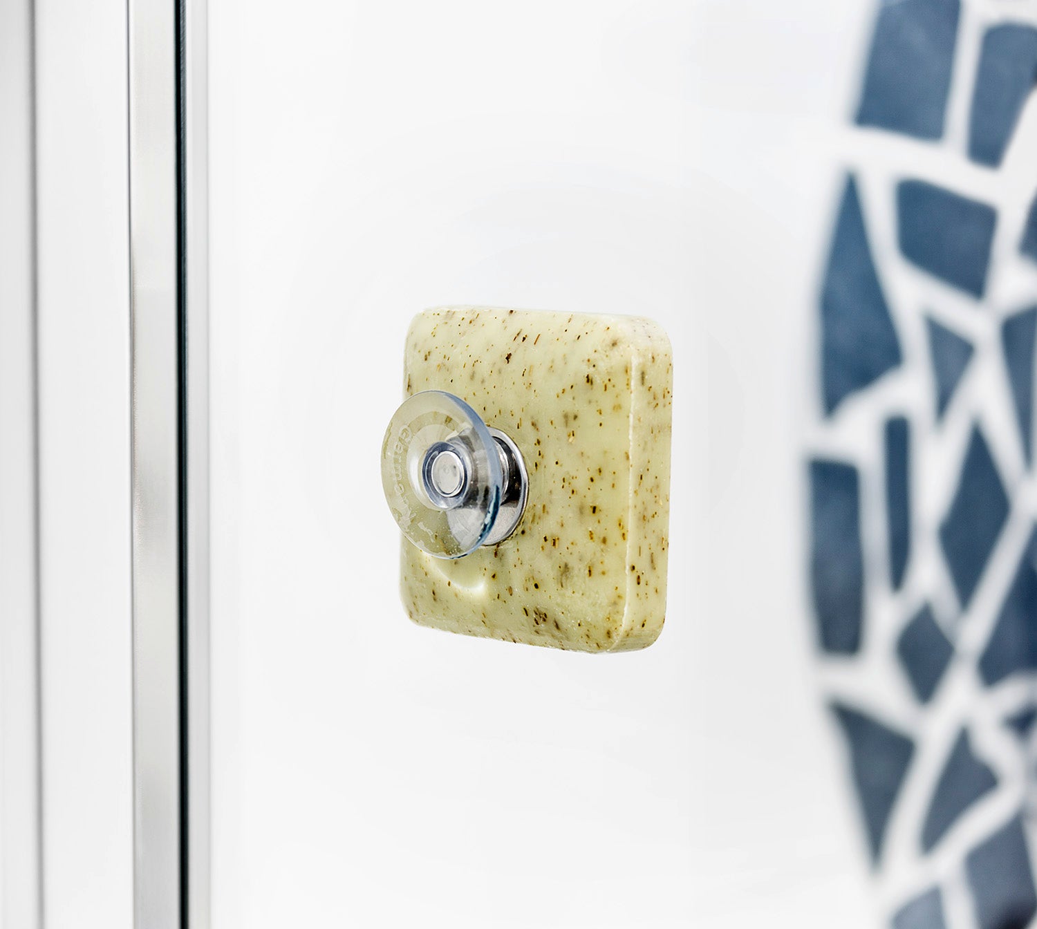 SAVONT magnetic floating soap holder attached to a white bathroom sink with a solid soap bar — view 10