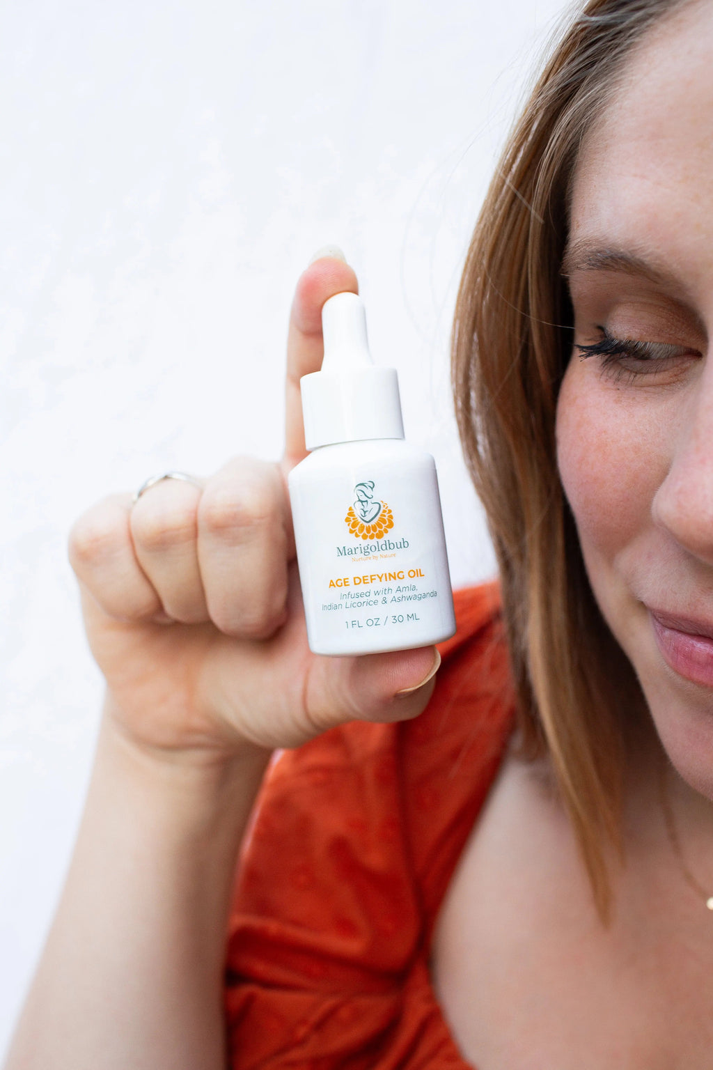 Age Defying Face Oil in a premium eco-friendly glass bottle with an easy application dropper. — view 4