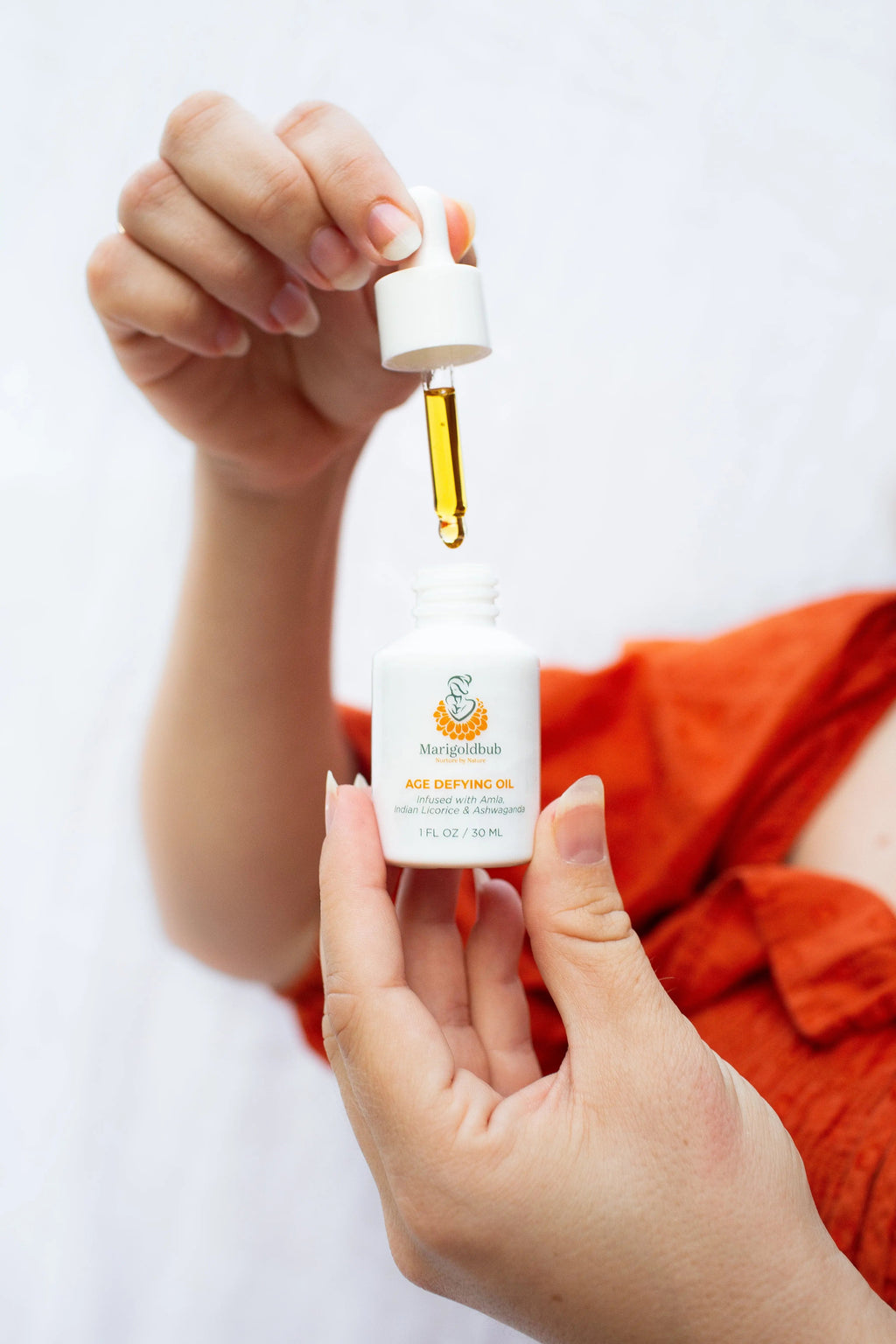 Age Defying Face Oil in a premium eco-friendly glass bottle with an easy application dropper. — view 3