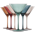 Set of six pastel colored crystal martini glasses in muted tones for elegant home bar entertaining