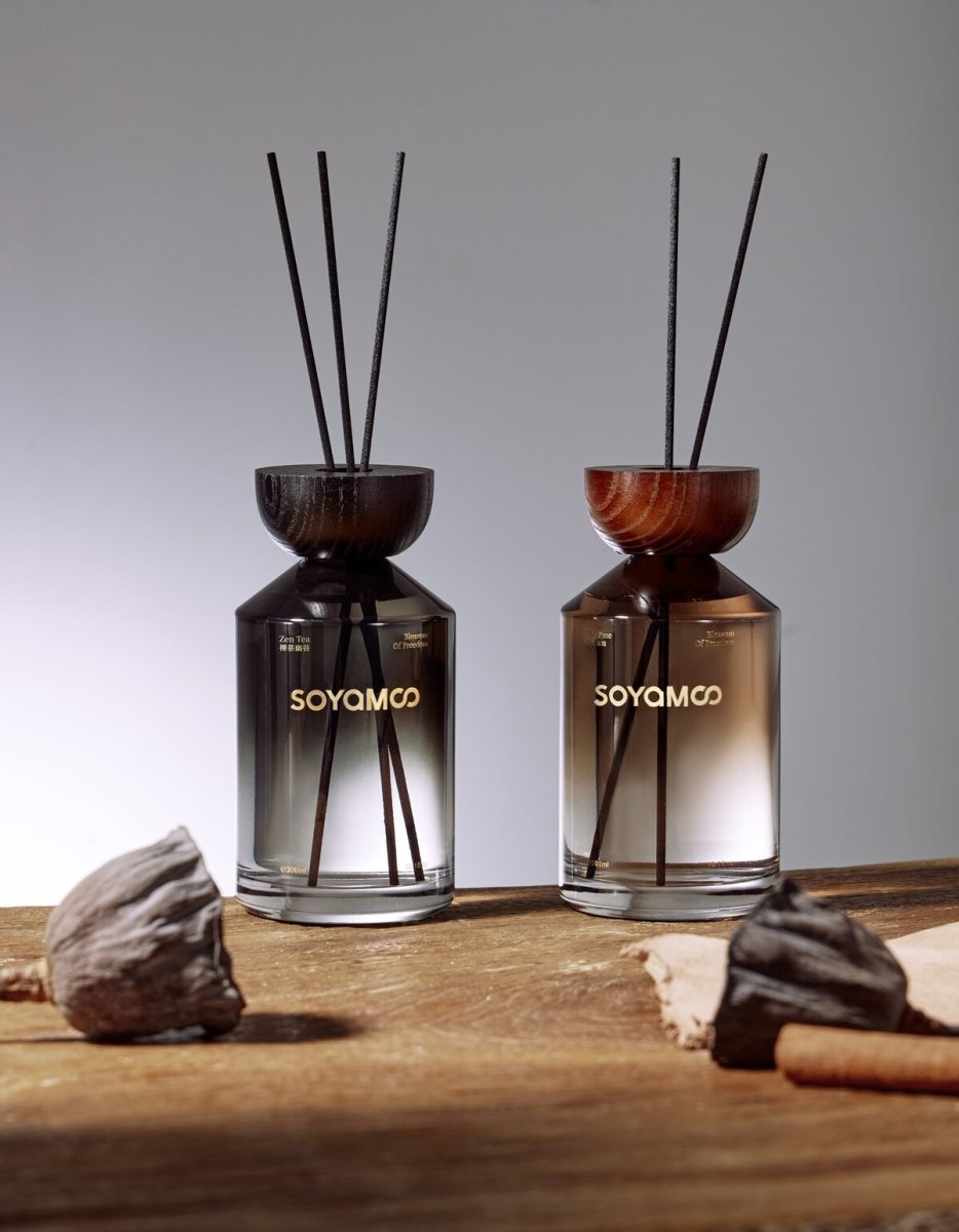 Warm brown angled shoulder glass reed diffuser with wooden cap and luxury woody fragrance — view 3