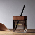 Matsuno wilderness reed diffuser in warm brown gradient square glass bottle with wooden cap