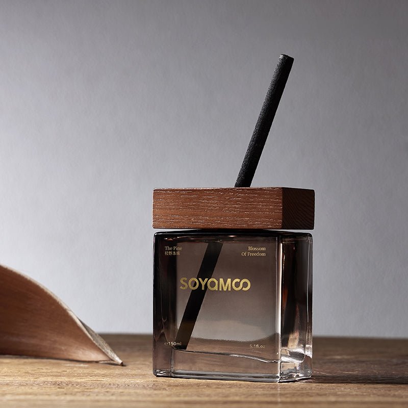 Matsuno wilderness reed diffuser in warm brown gradient square glass bottle with wooden cap
