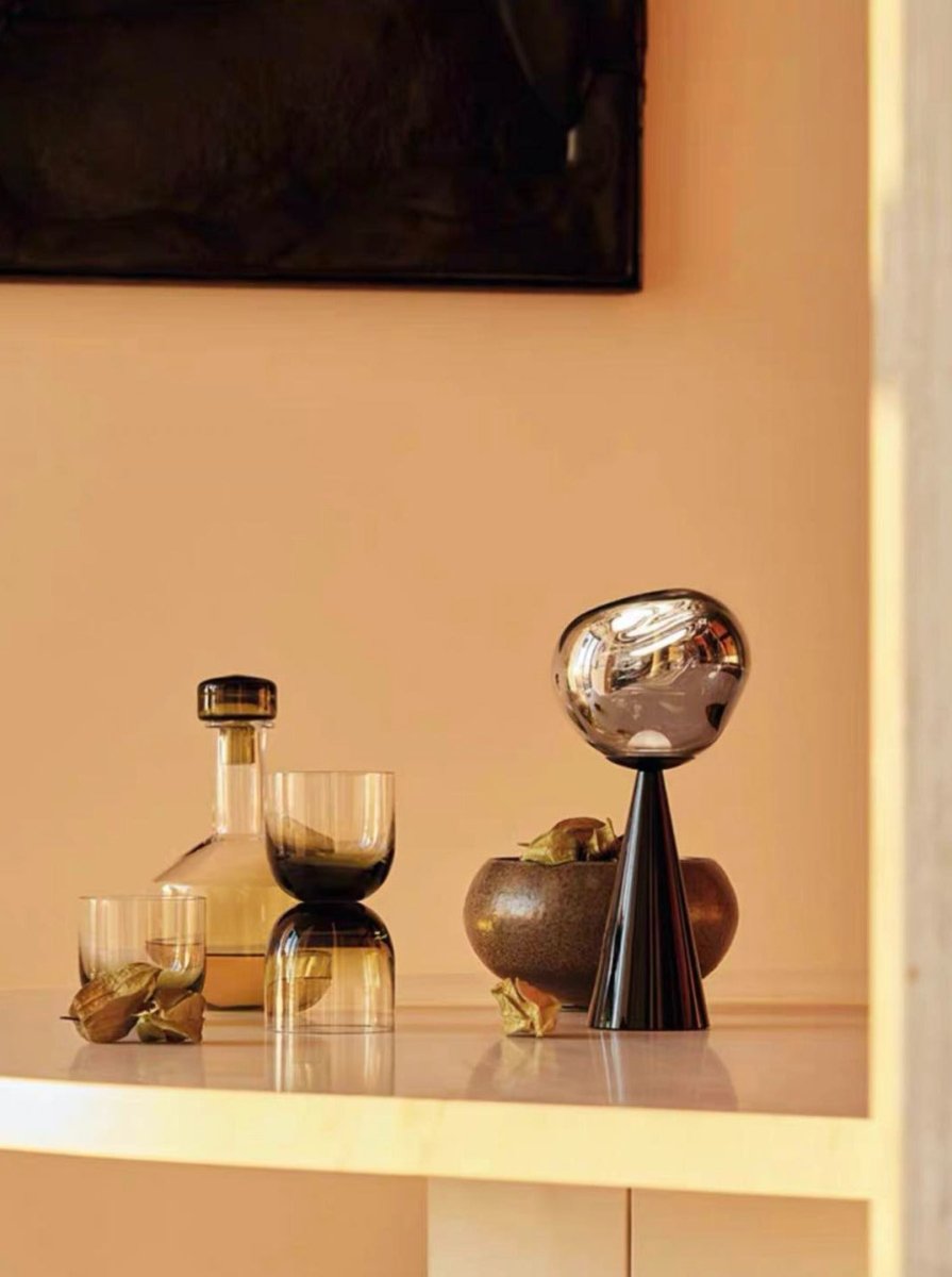 Melt portable dimmable table lamp featuring a glossy molten glass shade on a modern nightstand — view 4