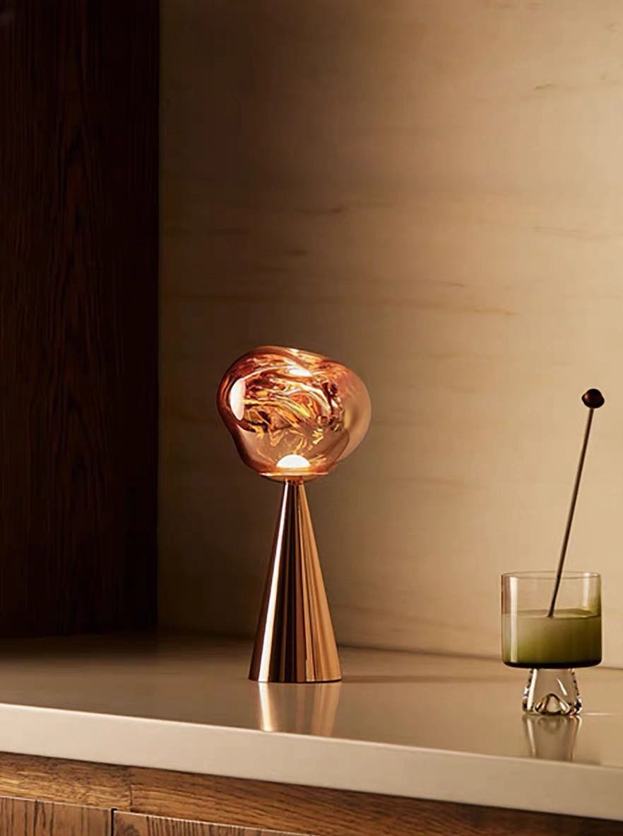 Melt portable dimmable table lamp featuring a glossy molten glass shade on a modern nightstand — view 5