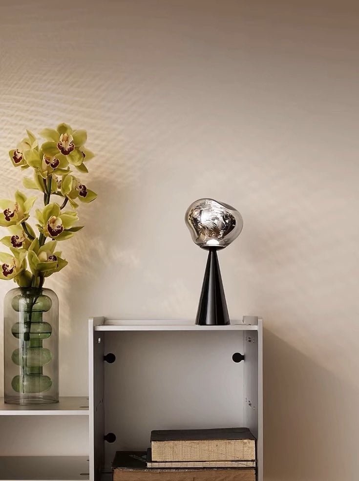 Melt portable dimmable table lamp featuring a glossy molten glass shade on a modern nightstand — view 3
