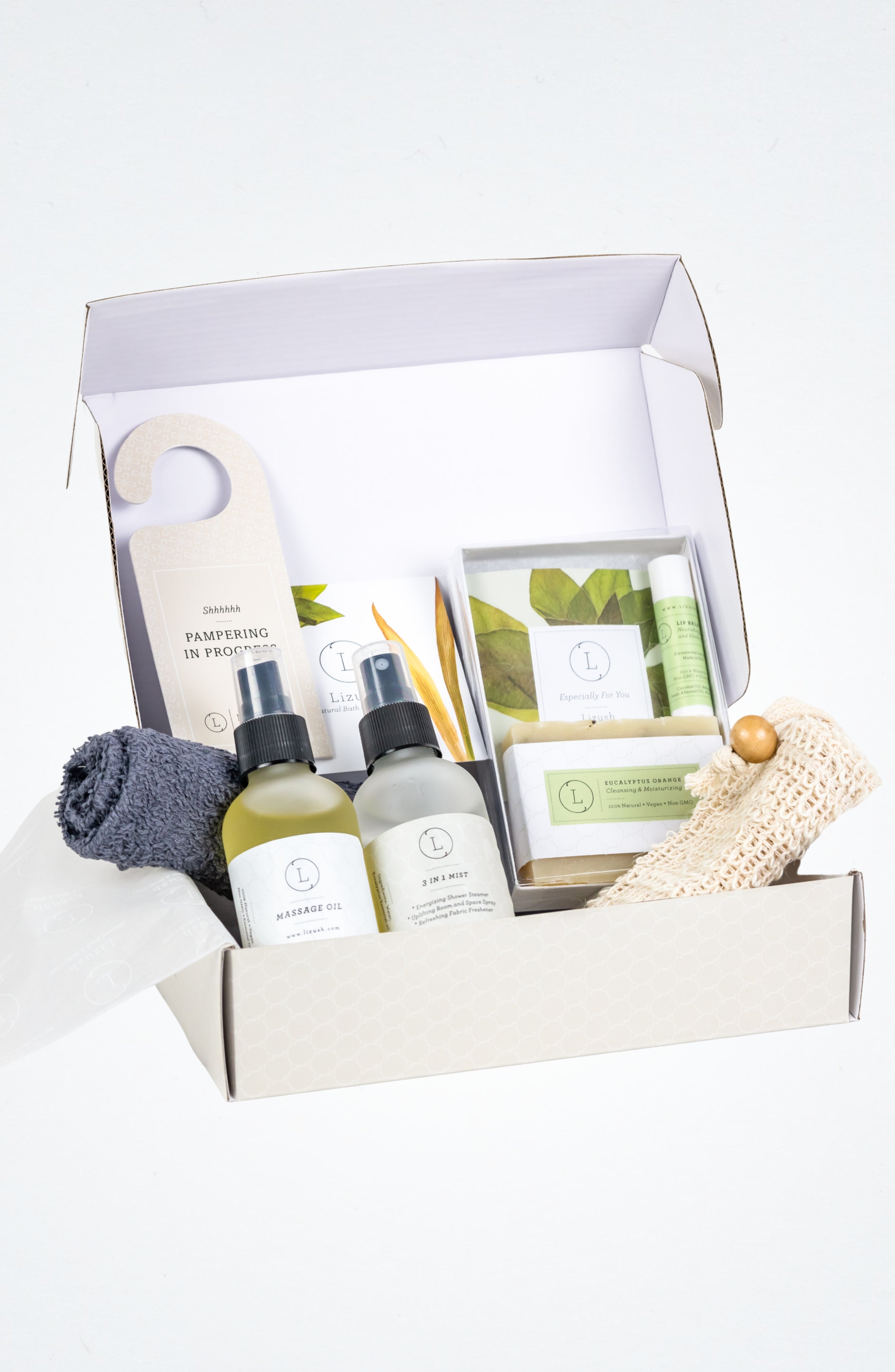Eucalyptus spa gift box with massage oil, mist, natural soap, and towel in elegant packaging — view 2