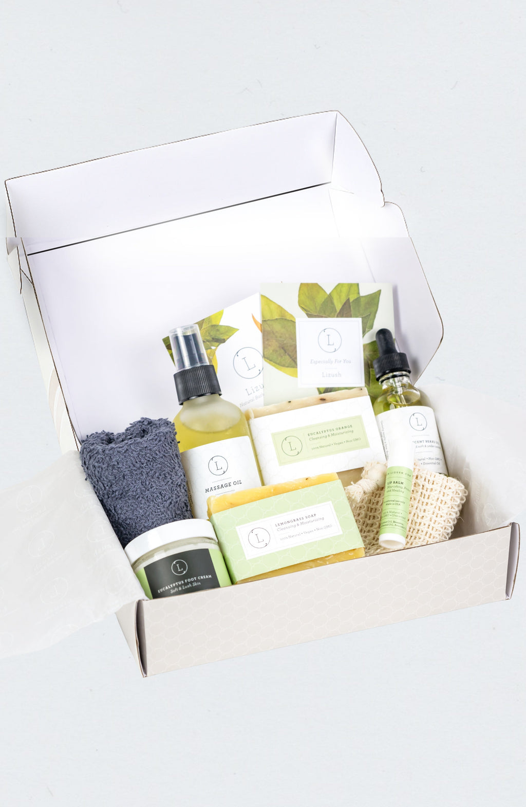 Natural eucalyptus men's grooming kit featuring beard oil, soap bars, and foot cream in gift box — view 2