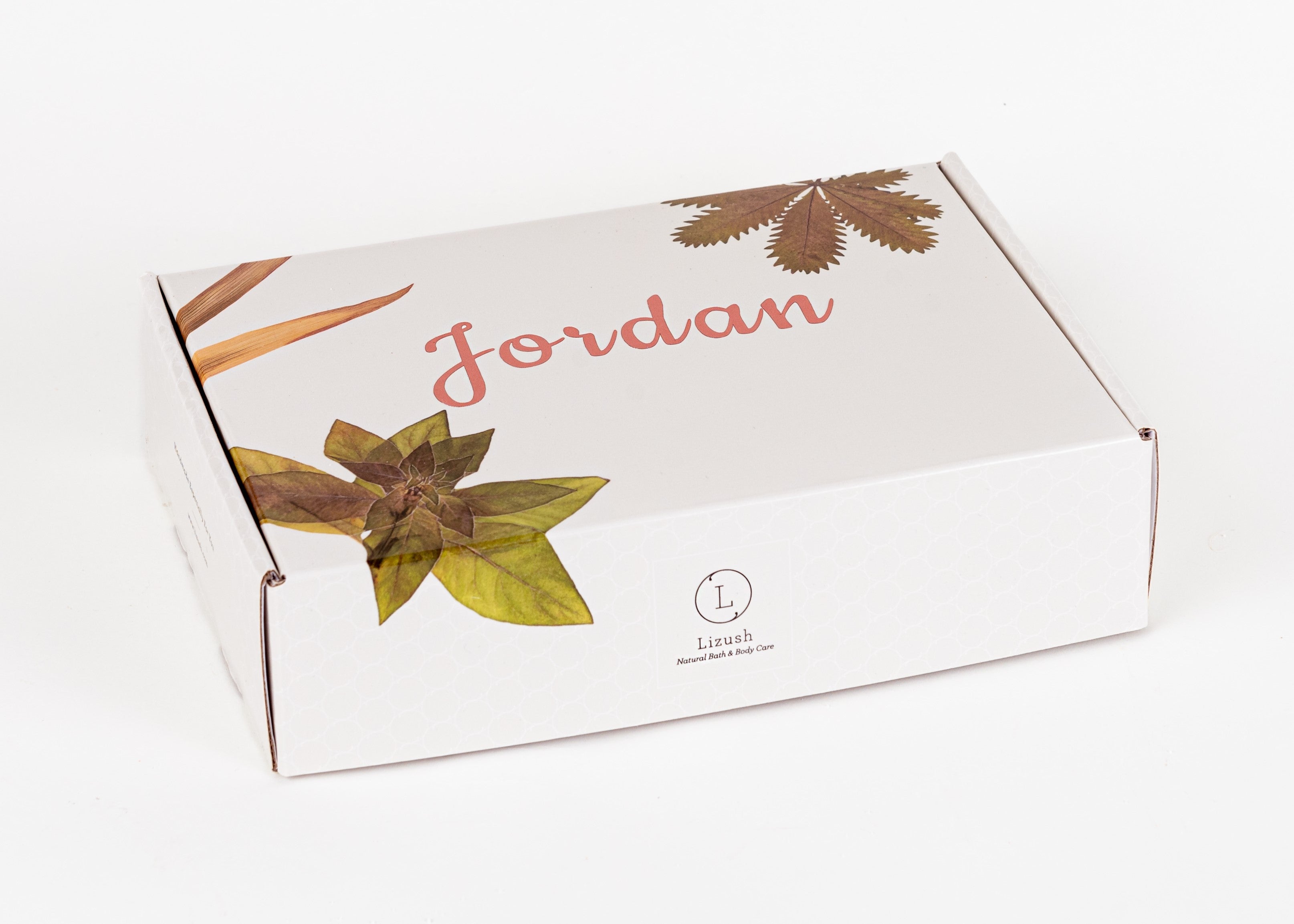 Organic baby skincare gift set in beautiful box featuring balms, oils, powder, and soft bibs — view 2