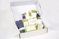 Natural eucalyptus men's grooming kit featuring beard oil, soap bars, and foot cream in gift box