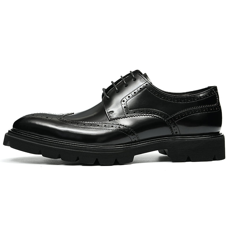 Men's wingtip brogue derby shoes in premium leather with embroidered accents and rugged platform base
