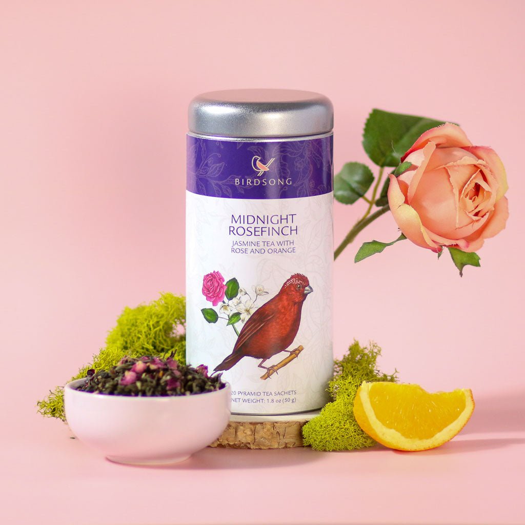Midnight Rosefinch loose leaf green tea blend featuring jasmine blossoms, rose petals, and dried orange