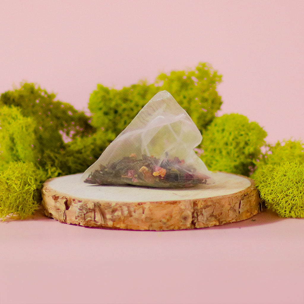 Midnight Rosefinch loose leaf green tea blend featuring jasmine blossoms, rose petals, and dried orange — view 3