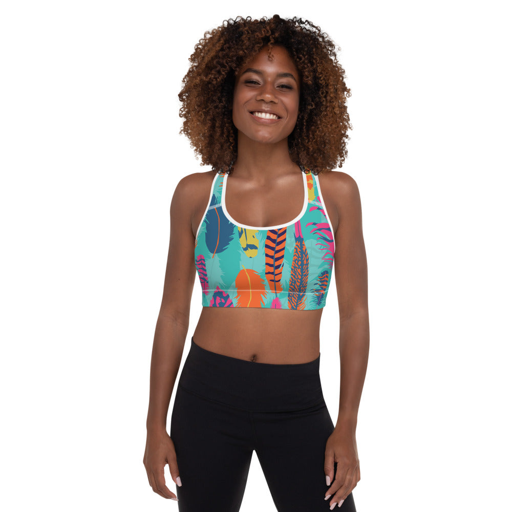 The Wanderer padded sports bra in animal print featuring a scoop neckline and racerback design
