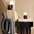 Modern spiral bedside table lamp in a quirky chunky design with vibrant ceramic color finish