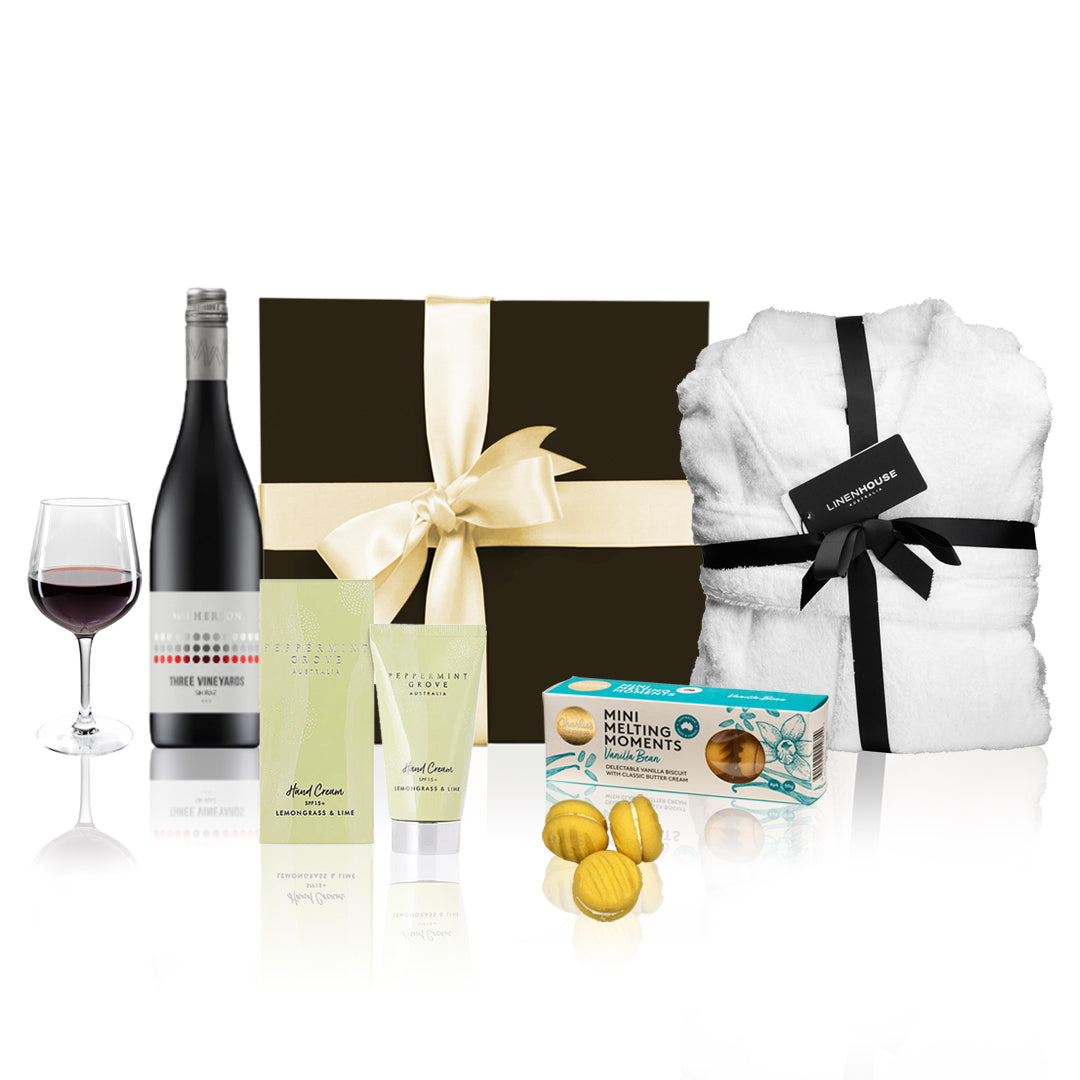 Luxury red wine hamper gift box with bath robe, shiraz bottle, hand cream, and gourmet cookies