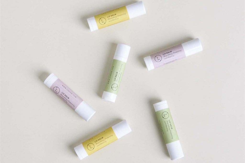Set of 3 natural unscented lip balms in eco-friendly reusable cotton drawstring gift bag. — view 3