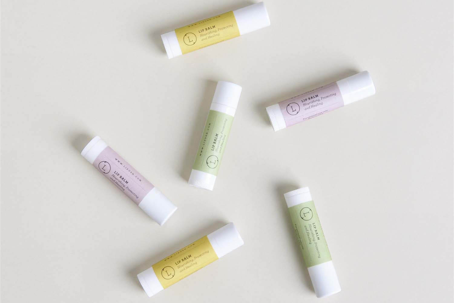 Set of 3 natural unscented lip balms in eco-friendly reusable cotton drawstring gift bag. — view 3