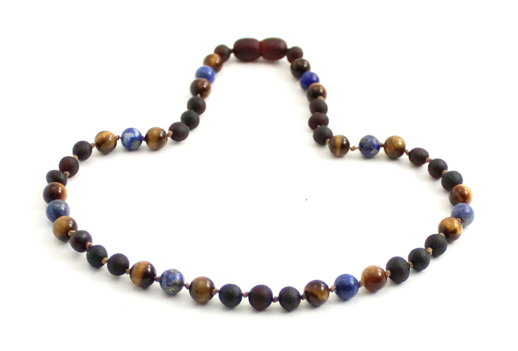 Gemstone necklace featuring raw cherry amber, lapis lazuli, and brown tiger eye beads. — view 3