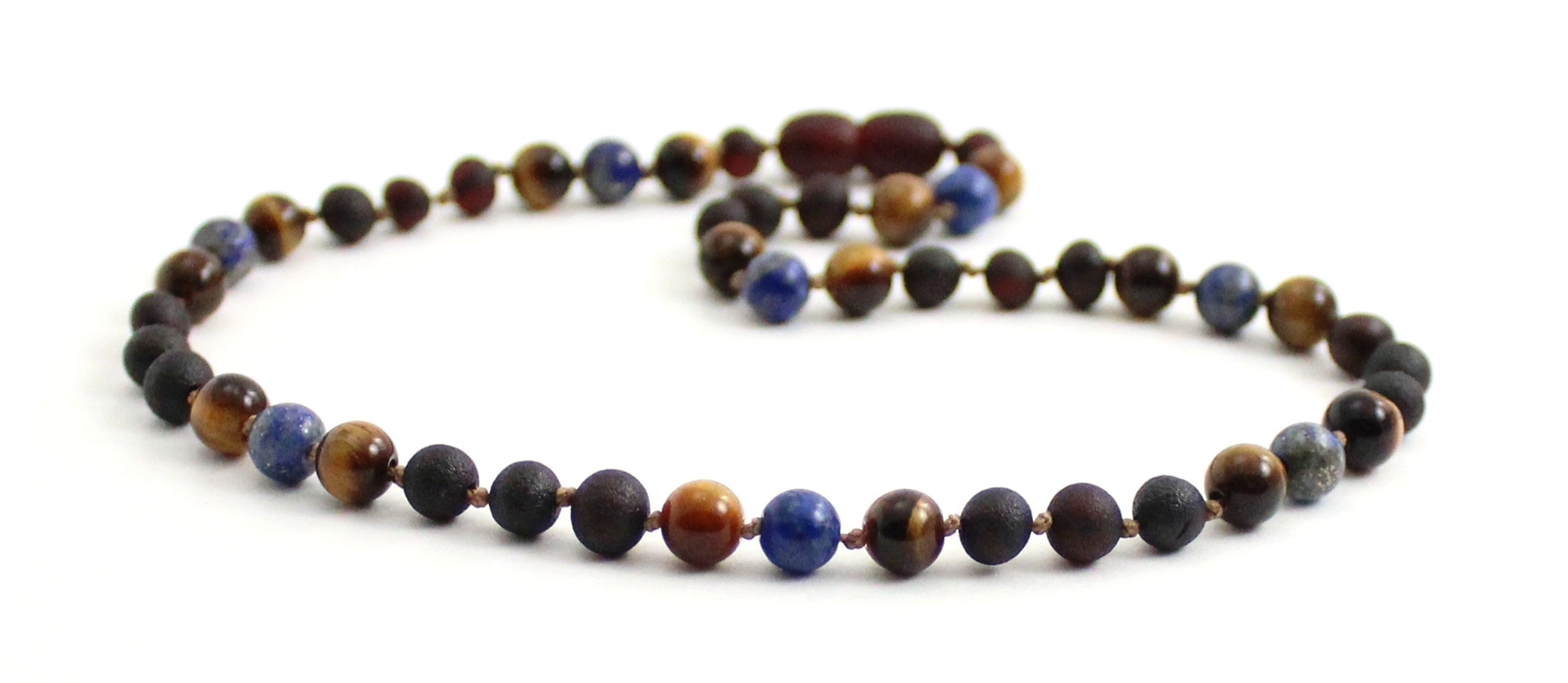 Gemstone necklace featuring raw cherry amber, lapis lazuli, and brown tiger eye beads. — view 4