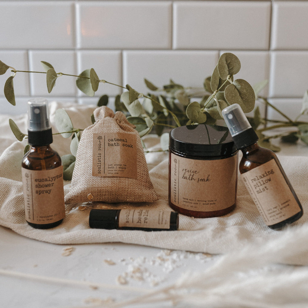 Spa gift set with eucalyptus spray, pillow mist, headache roller, and lavender oatmeal bath soaks