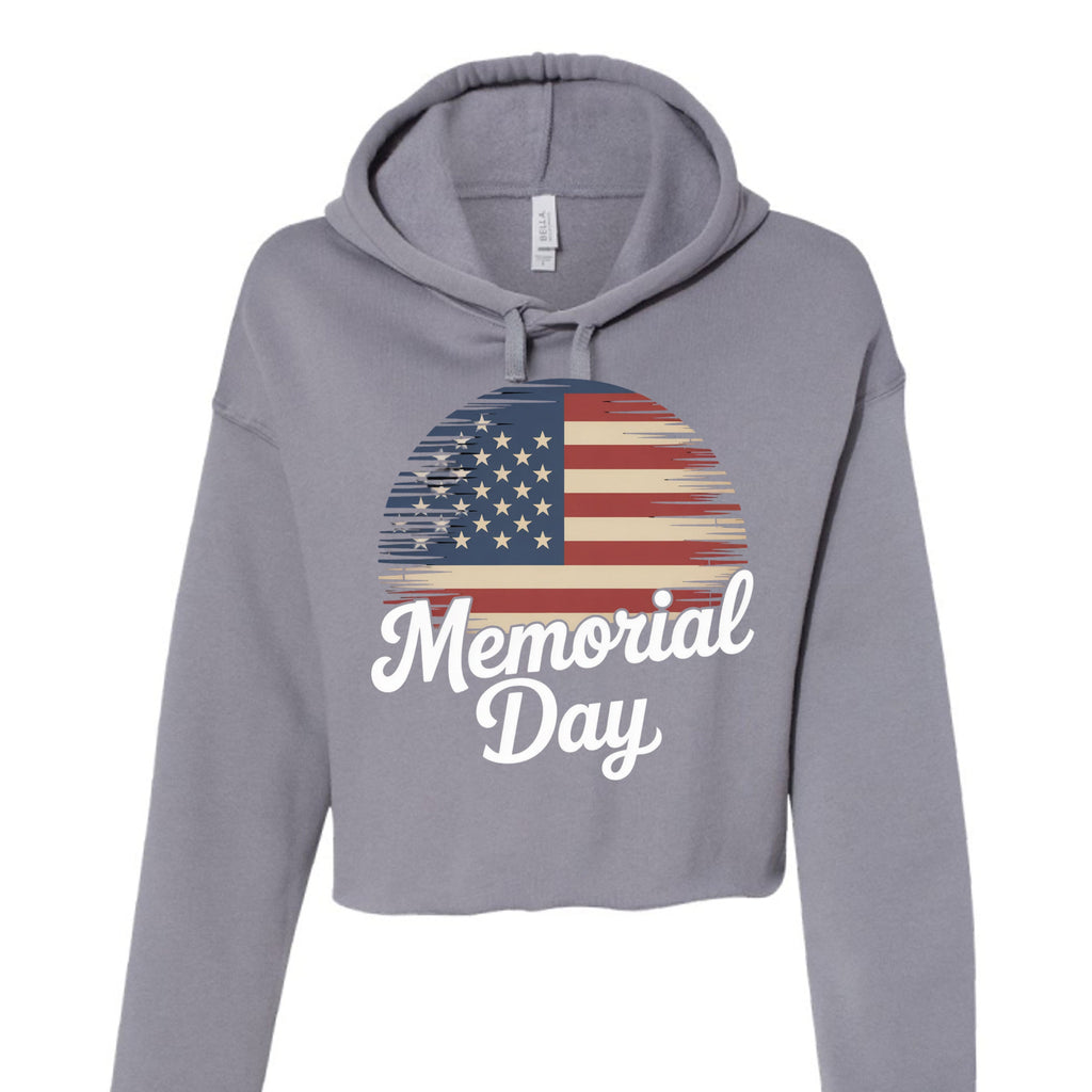 Women's cropped fleece hoodie featuring dropped shoulders, relaxed fit, and modern raw hem
