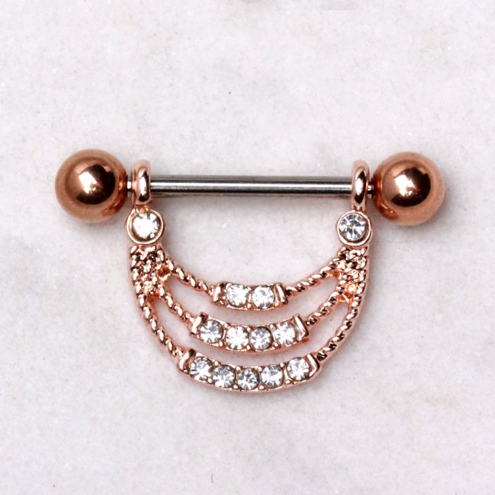 Rose gold plated triple layer rope nipple shield with clear cubic zirconia gems and barbell