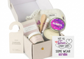 Natural bath and body spa gift box for nurses with lavender soap, candle, and mask.