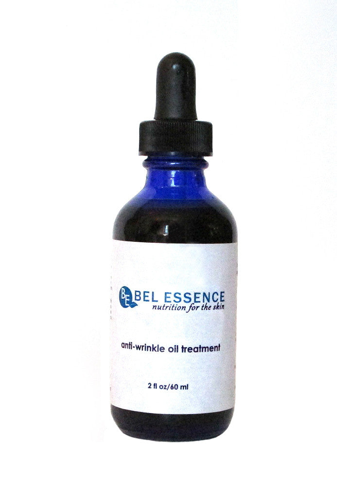 Two ounce bottle of natural anti-aging face serum with botanical oils and plant extracts.