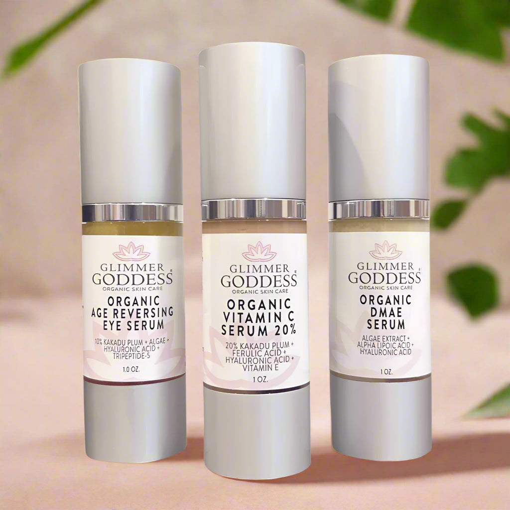 Three full-size organic anti-aging face and eye serums in dropper bottles for daily skincare — view 2