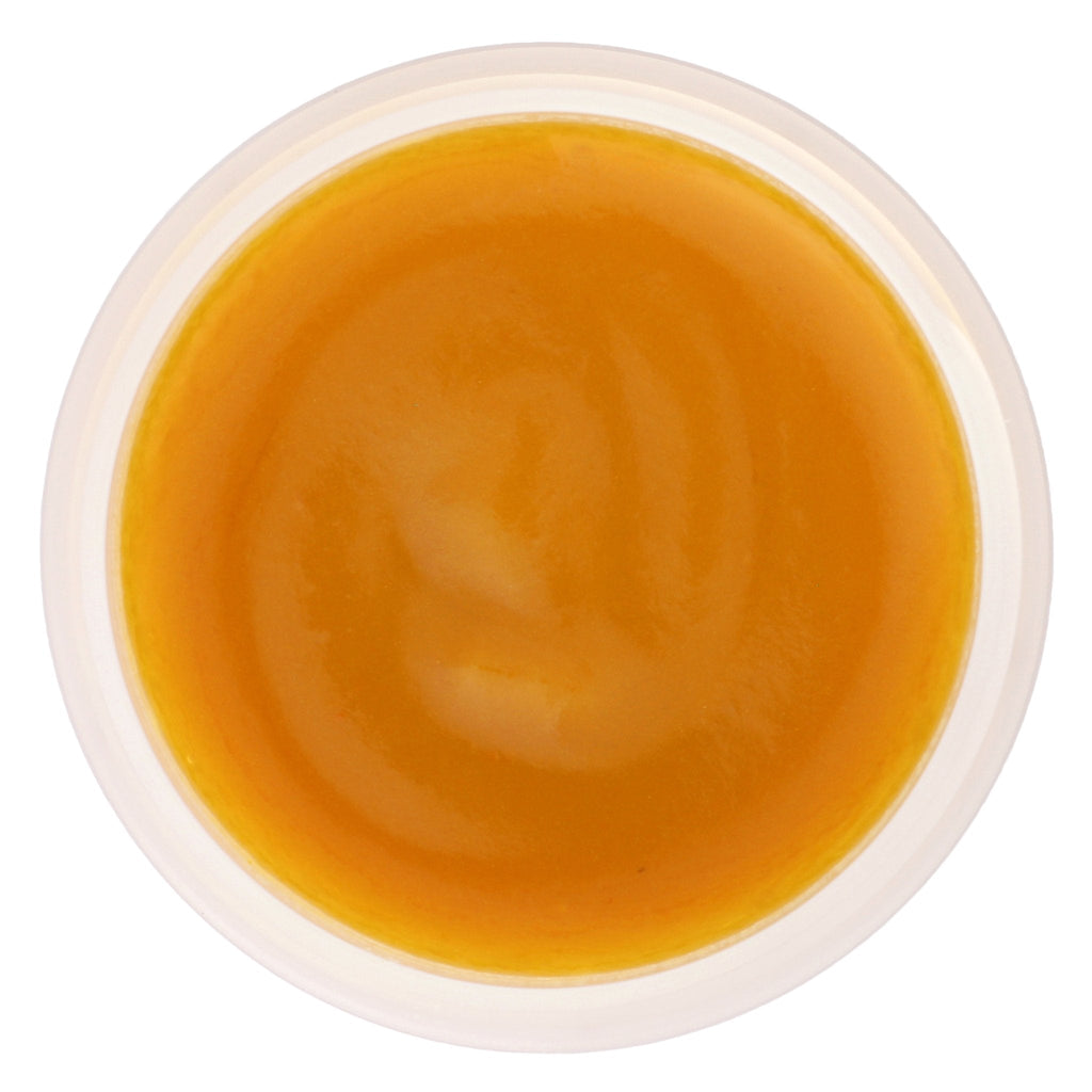Orange organic pumpkin AHA exfoliating face mask in a glass jar for anti-aging skincare. — view 3