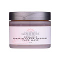 Orange organic pumpkin AHA exfoliating face mask in a glass jar for anti-aging skincare.