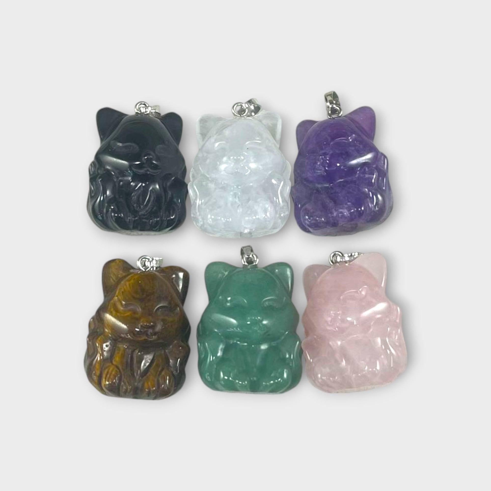 Nine tail fox shaped natural gemstone healing crystal pendant for spiritual wellness and balance.