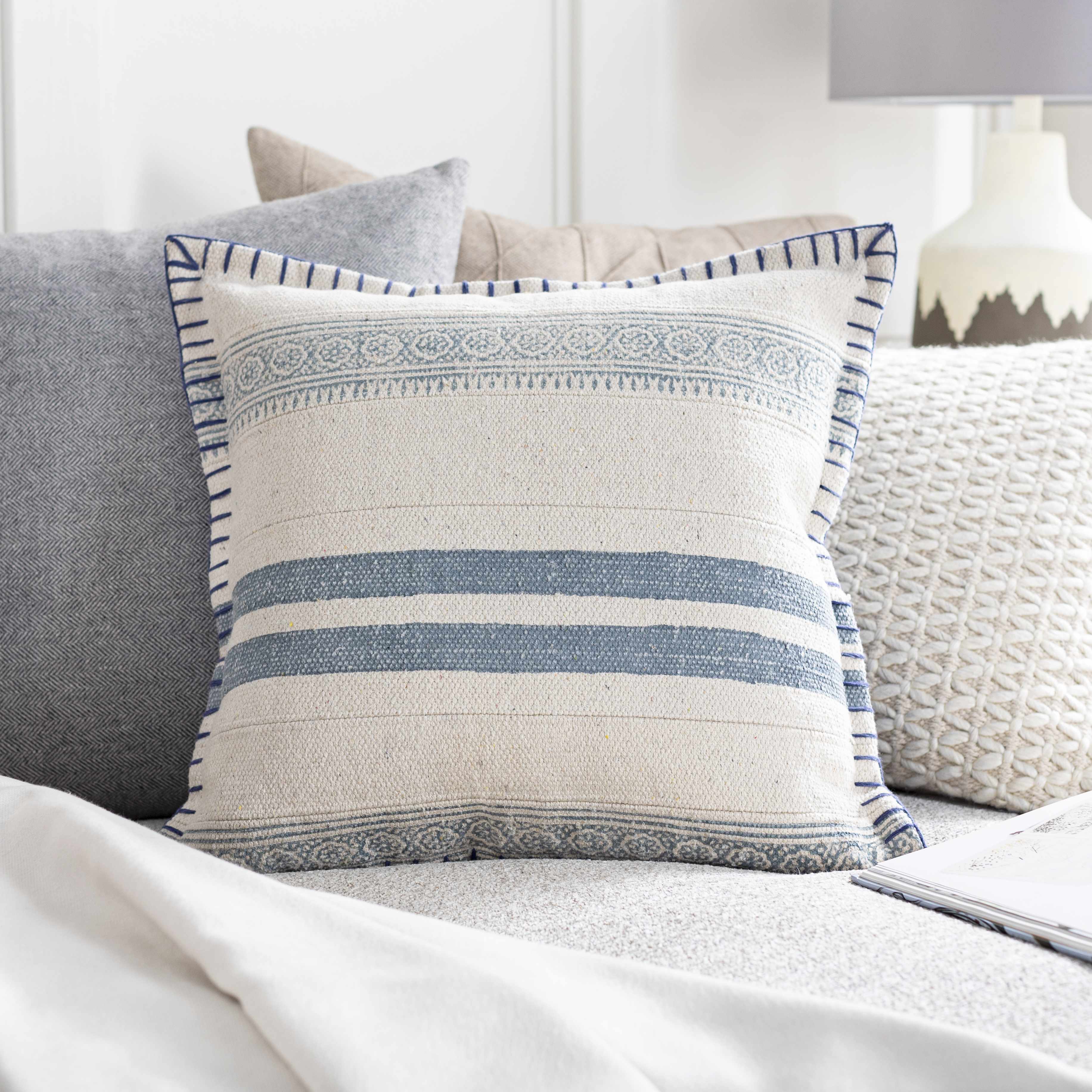 Square woven cotton throw pillow cover featuring a cream navy and pale blue bohemian design — view 2