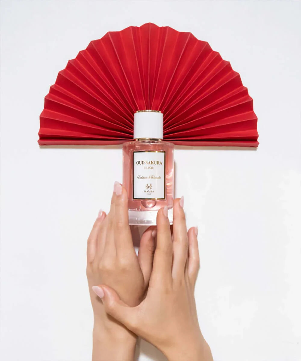 Elegant Oud Sakura 100ml glass perfume bottle showcasing premium French fragrance packaging — view 4