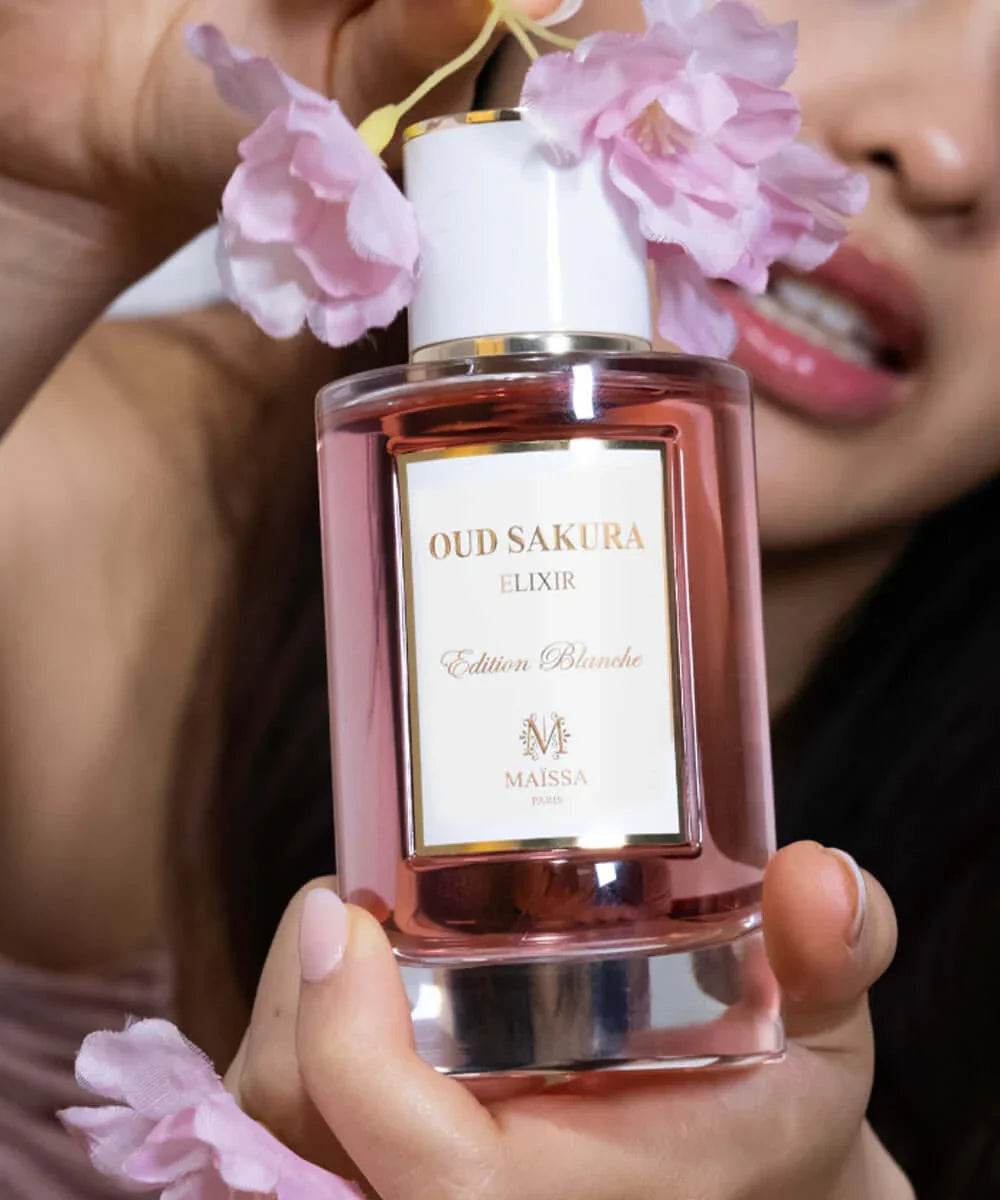 Elegant Oud Sakura 100ml glass perfume bottle showcasing premium French fragrance packaging — view 3