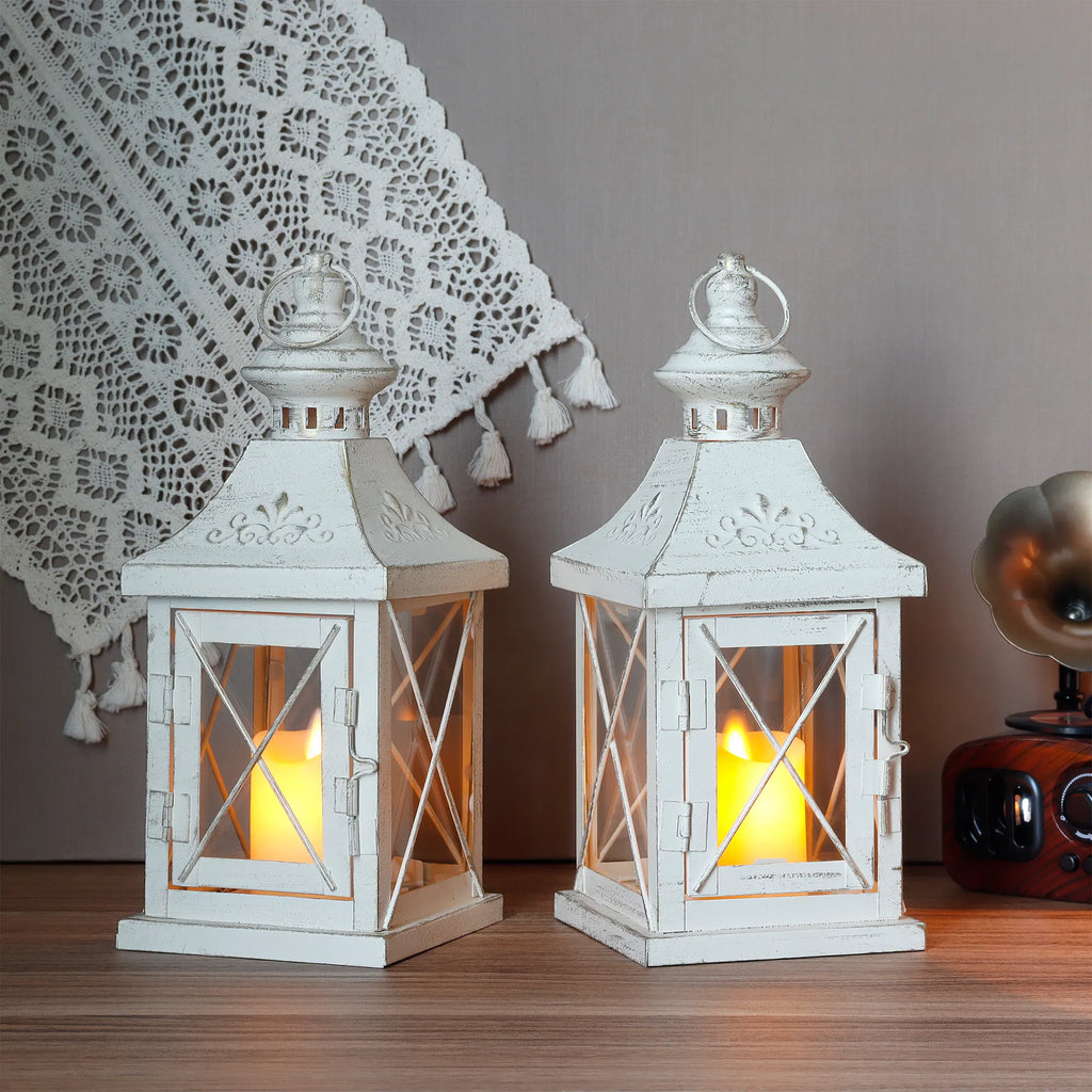 Set of two 11-inch white and gold brushed metal decorative candle lanterns with tempered glass panels