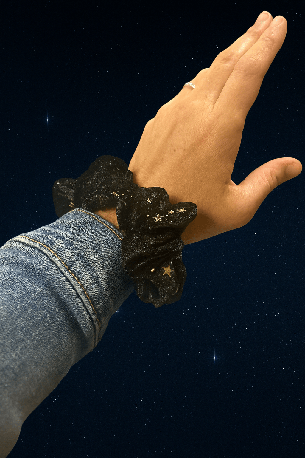 Plush velvet tranquil scrunchie hair tie infused with lavender, shown as a soft wrist accessory — view 5