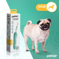Petsie small dog toothbrush featuring an ergonomic handle, indicator light, and replaceable bristle brush head