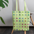 La Banane canvas tote bag featuring a colorful playful banana print and sturdy shoulder straps