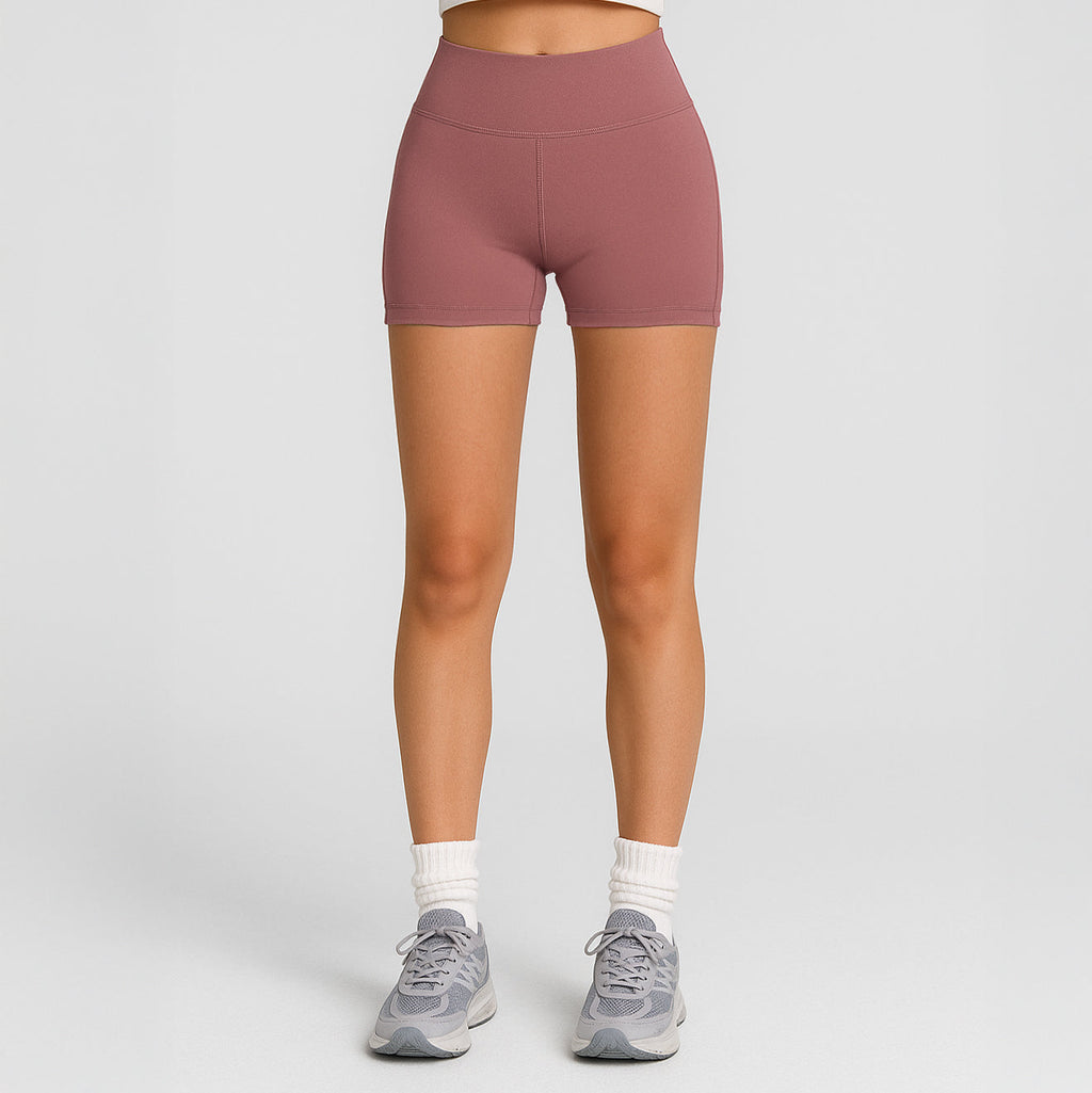 Women's athletic legging shorts in black with high rise waistband and flatlock seams