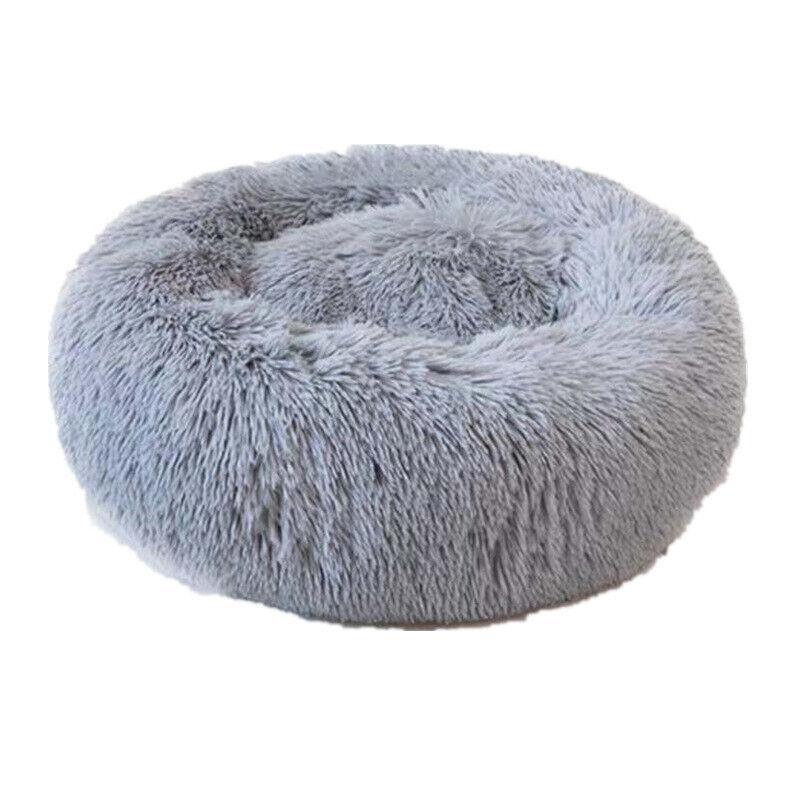 Calming plush round pet bed in soft fabric with waterproof base and washable zipper cover — view 2