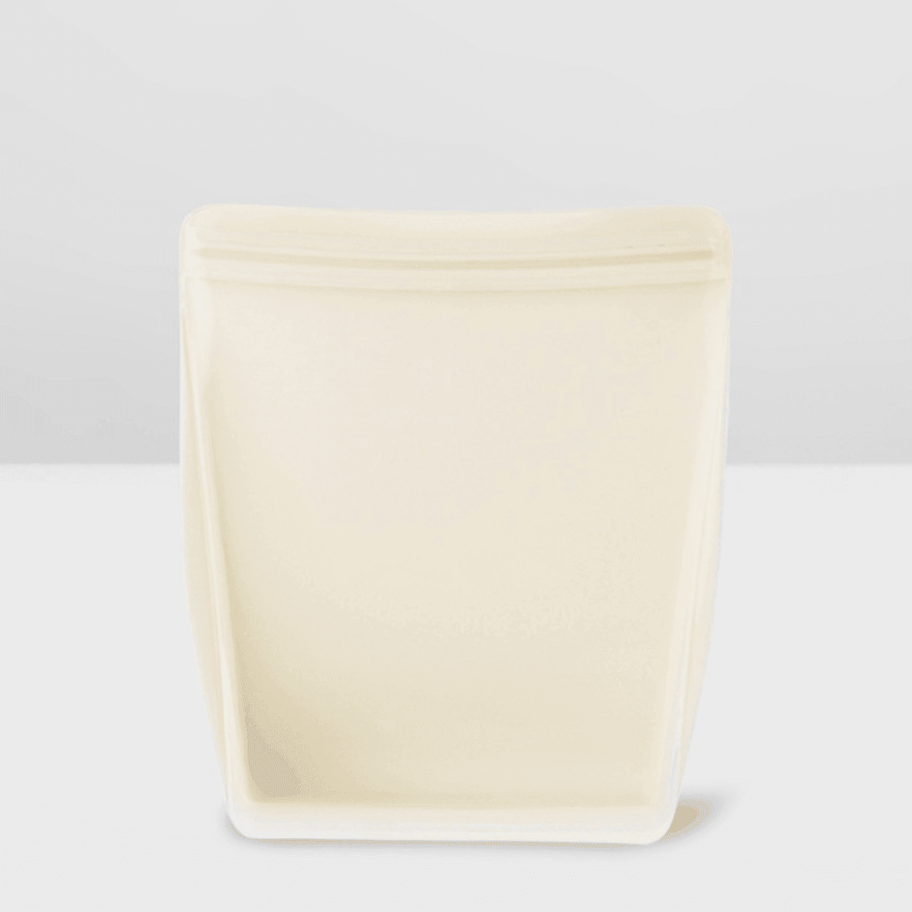 Cream reusable silicone stand up food storage bag with easy open seal for meal prep